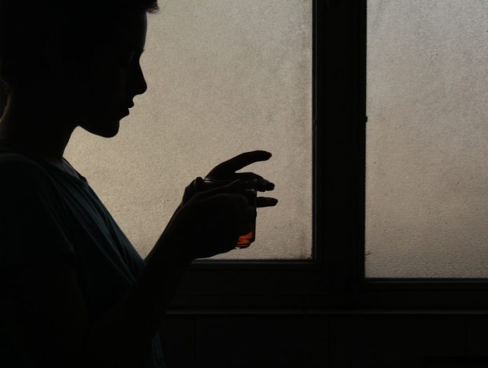 Photo by samane mohammadi person holding cup
