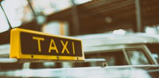 Injured in a Taxi in Missouri? Know Your Legal Options black and yellow Taxi signage