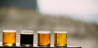 a group of glasses with liquid in them