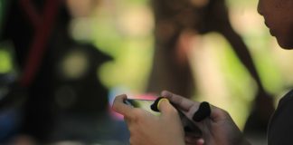 Chicken Road 2 Game in India A woman is looking at her cell phone