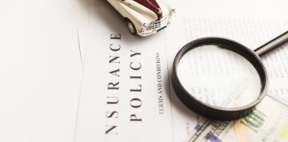 a magnifying glass sitting on top of a piece of paper