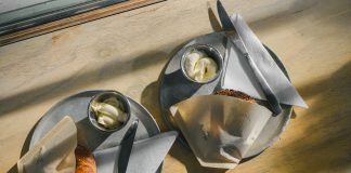 a couple of cups of food on a table