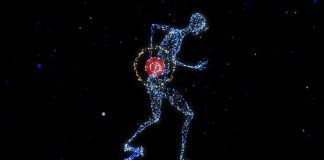 a man with a red ball in his hand