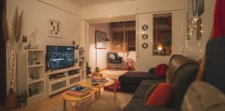 Smart Furnace Replacement Tips When Upgrading Your Home Heating a living room filled with furniture and a flat screen tv