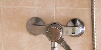 A shower faucet with a hand shower head