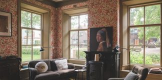 Heating Repair Guidance Designed for Homes That Need Balanced Warmth A cozy living room with an artwork on the wall.