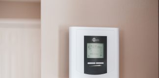 Furnace Repair Tips for Homes Needing Consistent Heat All Winter white and gray thermostat at 19 5