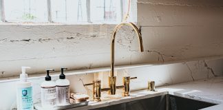 white ceramic sink with faucet