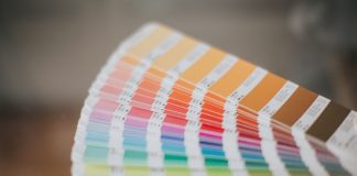 a close up of a pan of color samples