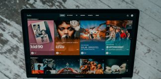 macbook pro on white table