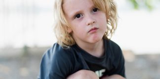 child in black crew-neck t-shirt