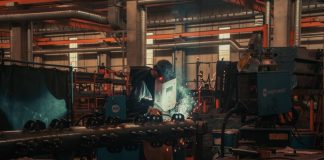 A man working on a machine in a factory