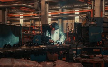 A man working on a machine in a factory
