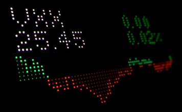 How to Invest in ETFs in Singapore: A Beginner’s Guide to STI and Index Funds a close up of a clock with numbers on it