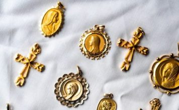 How to Choose a Gold Crucifix That Feels Both Sacred and Stylish gold and silver floral textile