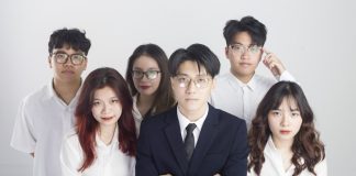 a group of people standing next to each other
