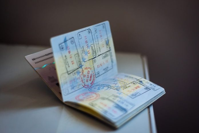 Photo by Global Residence Index a book on a table