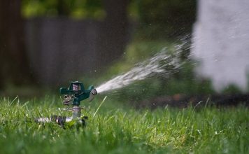 A Guide to Sprinkler and Irrigation Systems for Your Lawn green and black lego toy on green grass during daytime