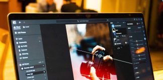Photo editing software is shown on a laptop screen