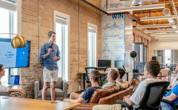 How Nonprofits Can Streamline Volunteer and Staff Training man standing in front of group of men