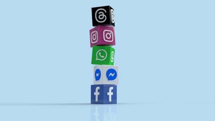 Photo by Shutter Speed a stack of colorful blocks with social icons on them