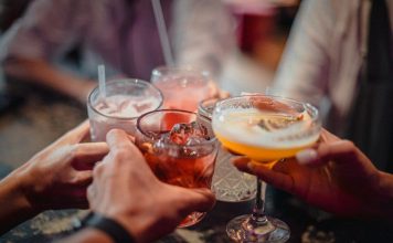 Why Your Friends’ Drinking Habits Could Influence Your Own: What To Be Aware Of A group of people holding drinks in their hands