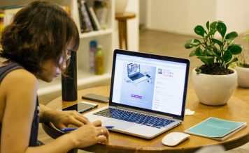 woman browsing on her laptop