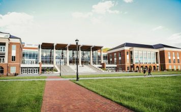 What Does It Mean to Be Admitted to a College? brown and white concrete building