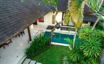 7 Common Mistakes to Avoid When Booking a Villa in Goa A house with a pool in the middle of it